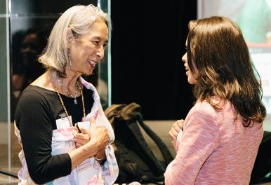 Two individuals are chatting.