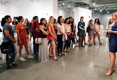 A group of interns are gathered together for an event.