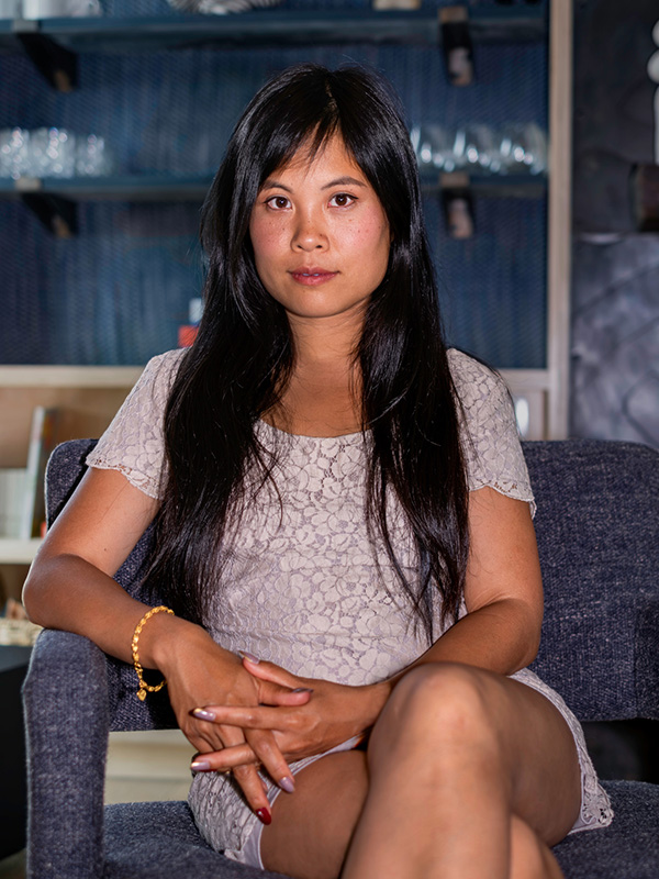 image of lena chen sitting in a chair