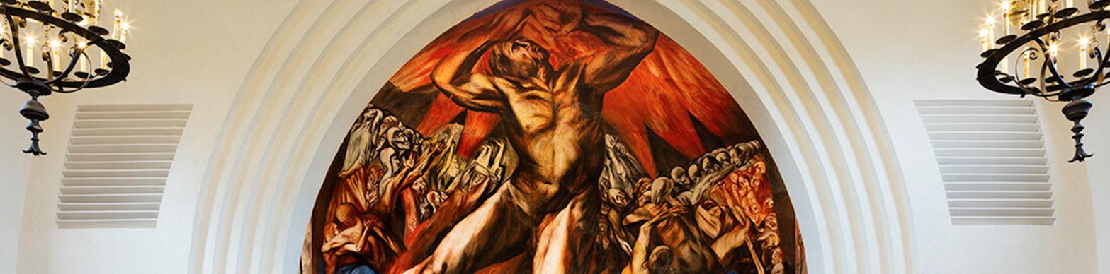 Mural of a biblical scene in a church-like room